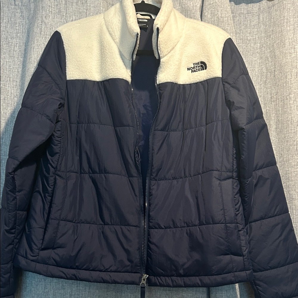 The North Face Dark Blue and White Puffer Jacket